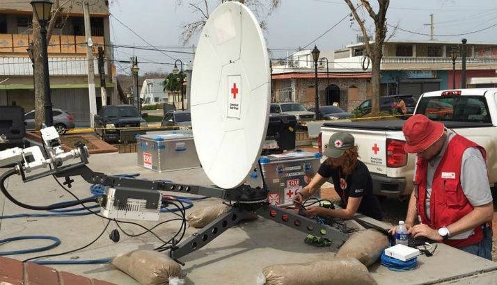 By setting up mobile satellites, the Red Cross is helping Puerto Ricans to reconnect with loved ones.