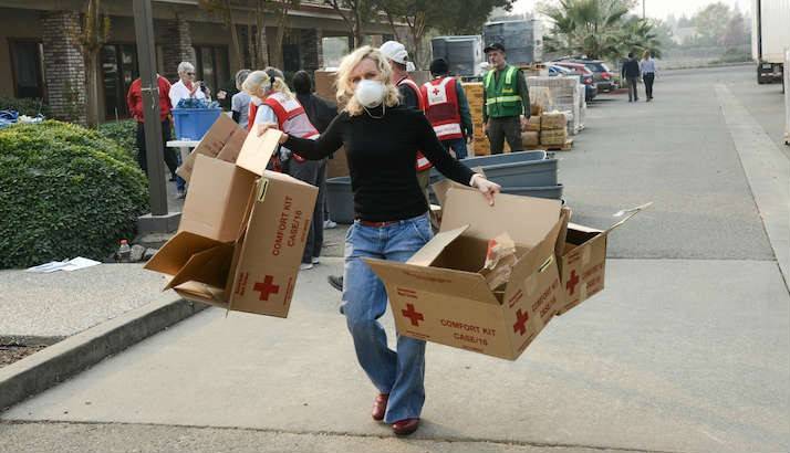 Red Cross volunteers work together in Yuba City, CA to produce Wildfire Relief Kits