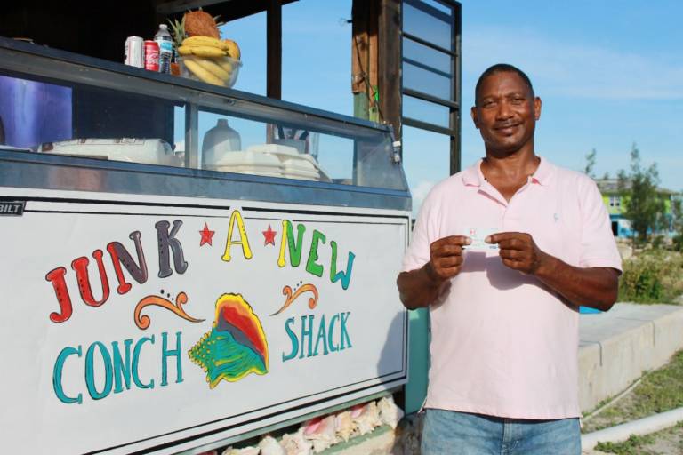 Robert Grant standing outside of his Conch Shack stand.