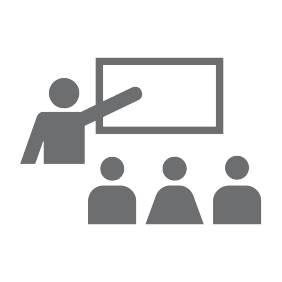 Icon of teacher instructing pupils and pointing to a presentation on the wall