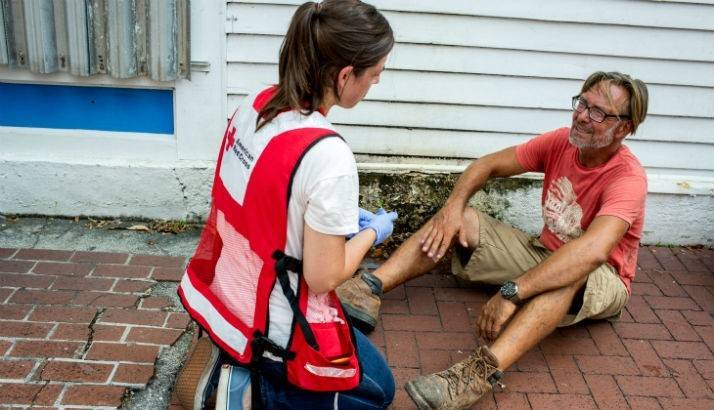 Michael receives disaster health services from Red Cross volunteer nurse Kelly Suter, Key West, Florida.