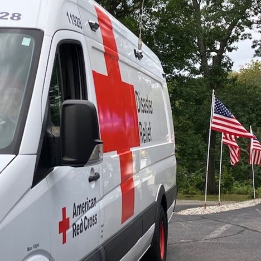 emergency response vehicle and american flags