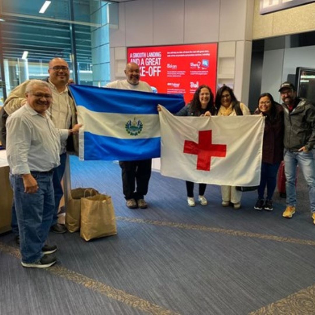 red crossers with salvador and red cross flag