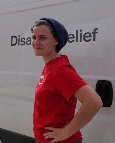 A Red Cross volunteer at a disaster relief operation